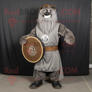 Gray Celtic Shield mascot costume character dressed with a Corduroy Pants and Belts