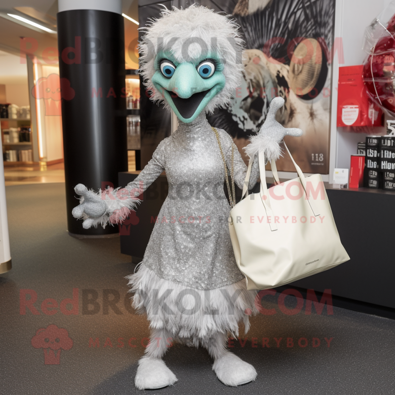 Silver Emu mascot costume character dressed with a Cocktail Dress and Tote bags