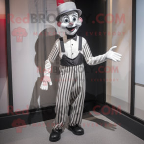 Silver Mime mascot costume character dressed with a Vest and Belts