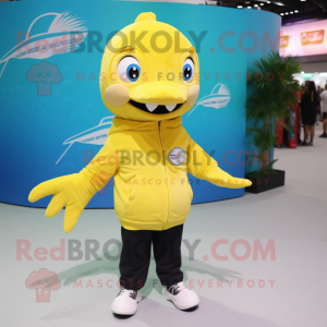 Lemon Yellow Barracuda mascot costume character dressed with a Coat and Beanies