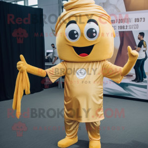 Gold Moussaka mascot costume character dressed with a Romper and Headbands