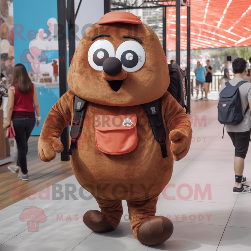 Brown Shakshuka mascot costume character dressed with a Poplin Shirt and Backpacks