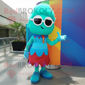 Turquoise Rainbow mascot costume character dressed with a Skirt and Sunglasses