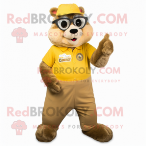 Gold Marmot mascot costume character dressed with a Chinos and Rings