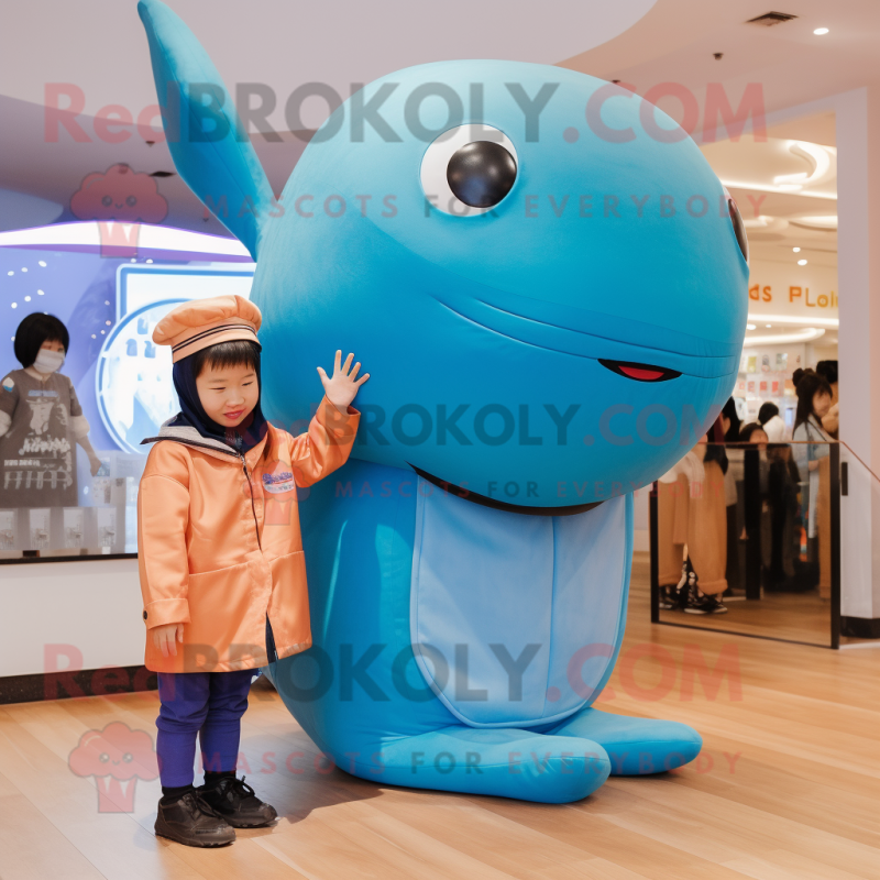 Brown Blue Whale mascot costume character dressed with a Jumpsuit and Scarves