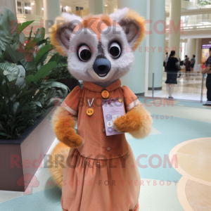 Peach Lemur mascot costume character dressed with a Empire Waist Dress and Lapel pins