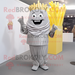 Silver French Fries mascot costume character dressed with a Suit Pants and Wraps