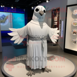 Silver Dove mascot costume character dressed with a Cover-up and Belts